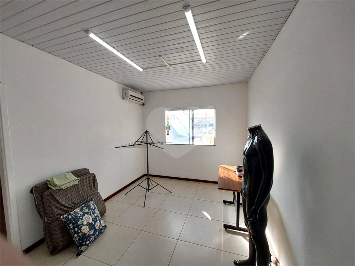 Casa residencial com ponto comercial a venda no Centro