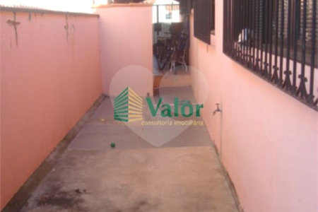 Casa com Edícula