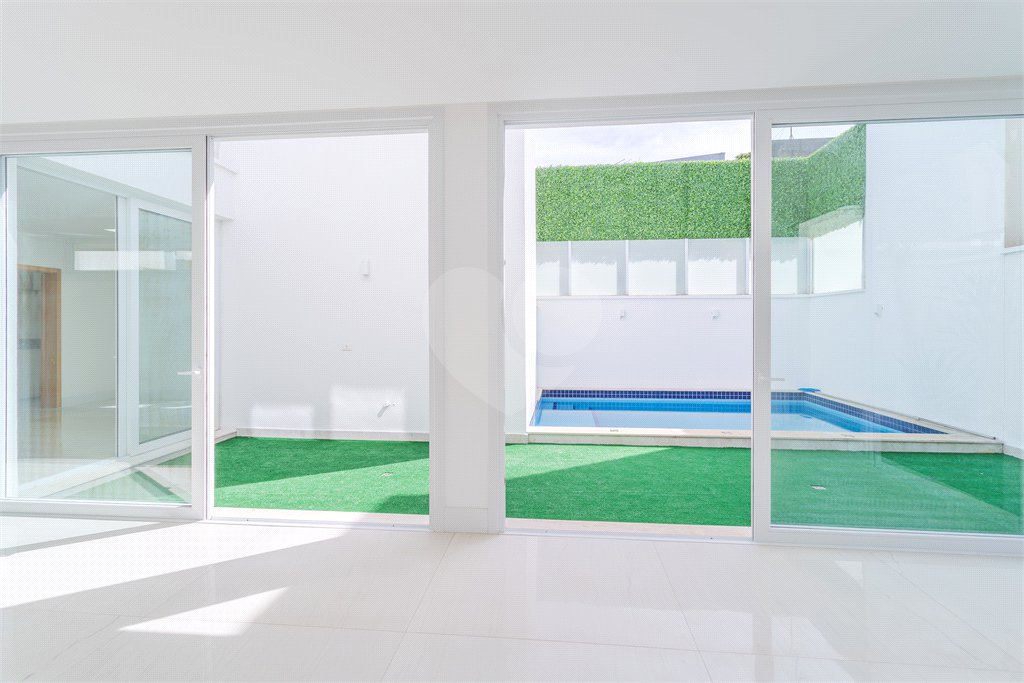 Casa à venda com 4 suítes no condomínio Villagio Quadrifolio, São Paulo - SP