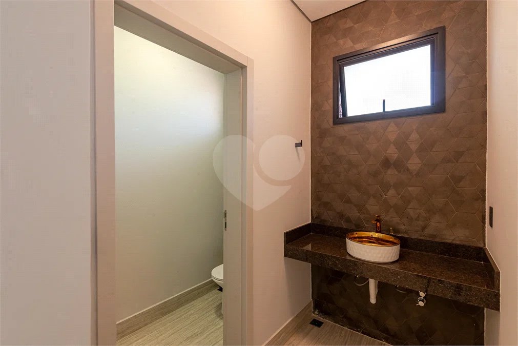 Casa à venda com 4 suítes no condomínio Vale da Santa Fé, Vinhedo - SP