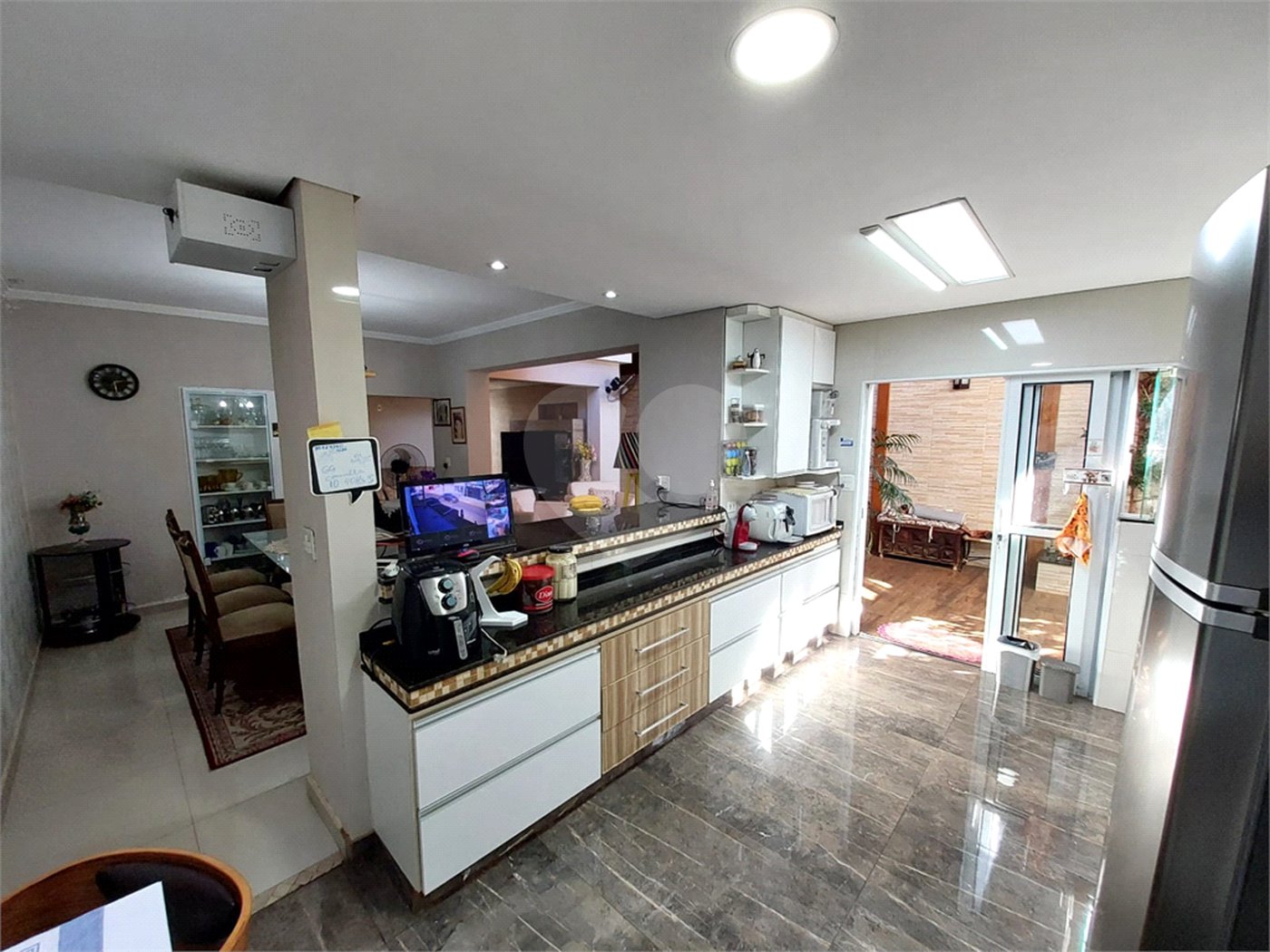 Casa residencial com ponto comercial a venda no Centro