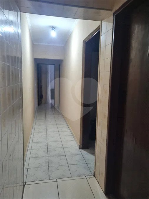 Casa com 183m², 3 dormitórios, 2 vagas, à venda em Santo André