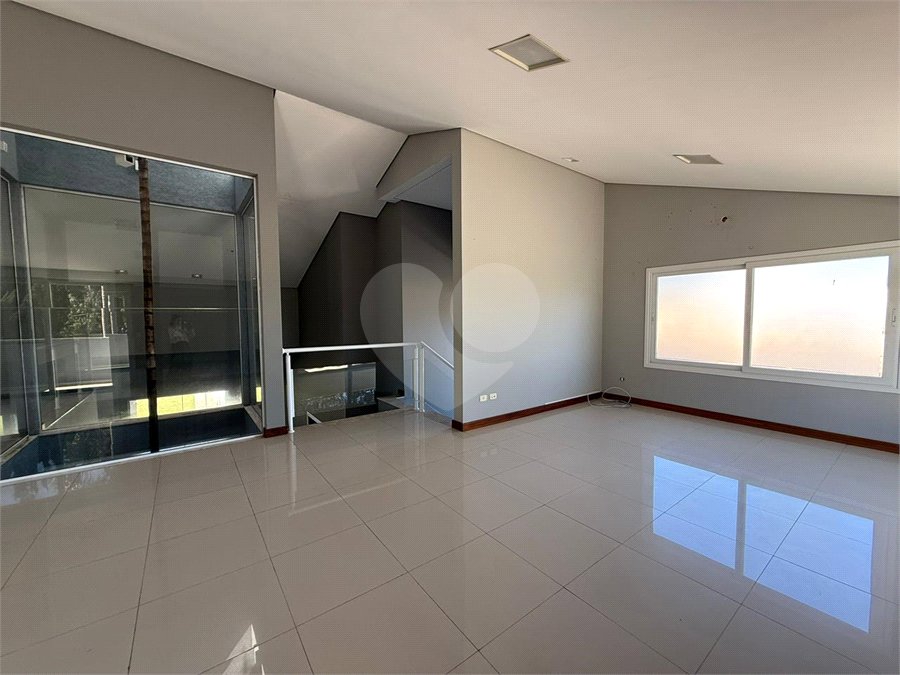 Casa alto padrão condomínio fechado em Atibaia com 4 suítes e ampla área de lazer, espaço gourmet, piscina, 6 vagas garagem
