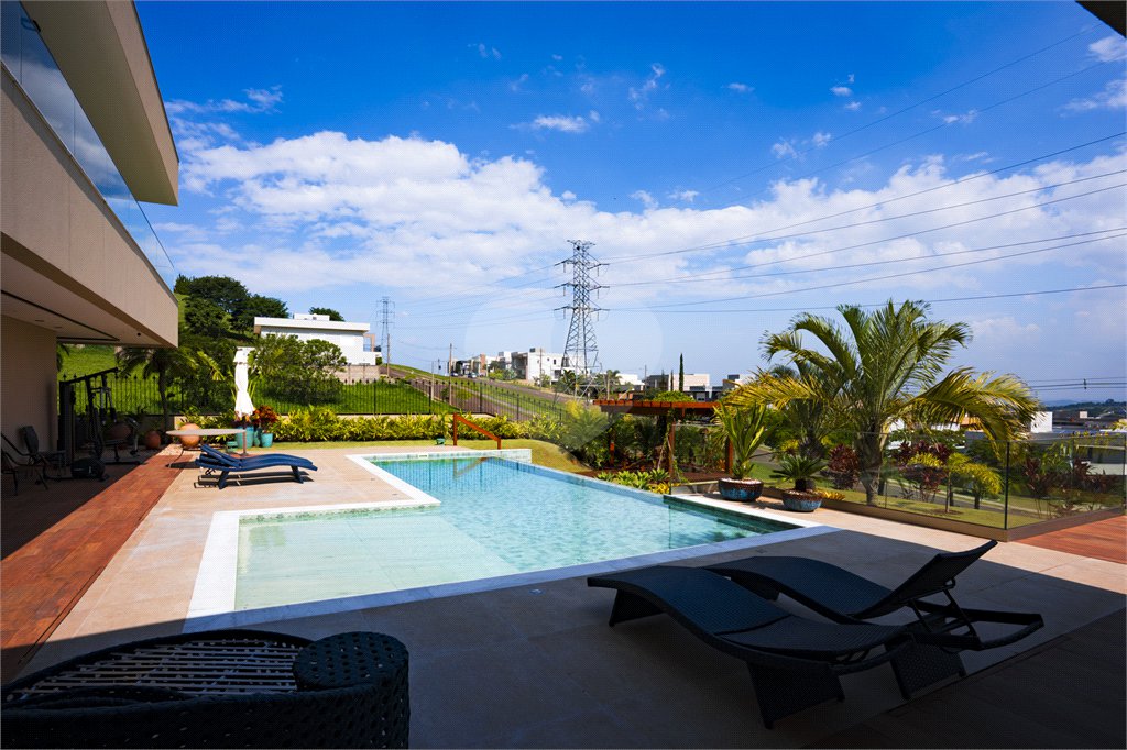 Casa à venda com 4 suítes no condomínio Campo de Toscana, Vinhedo - SP