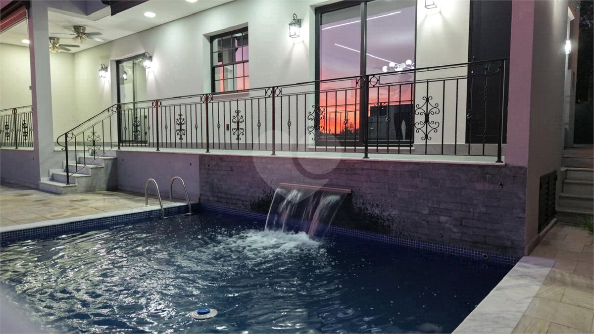 Casa à venda com 4 suítes no condomínio Alphaville Dom Pedro 3, Campinas - SP
