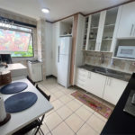 Apartamento com 2 dormitórios à venda, 64 m² por R$ 360.000,00 - Jardim Praiano - Guarujá/SP