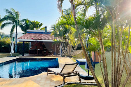 Casa à venda com 4 suítes no condomínio Residencial Vale das Laranjeiras, Indaiatuba - SP