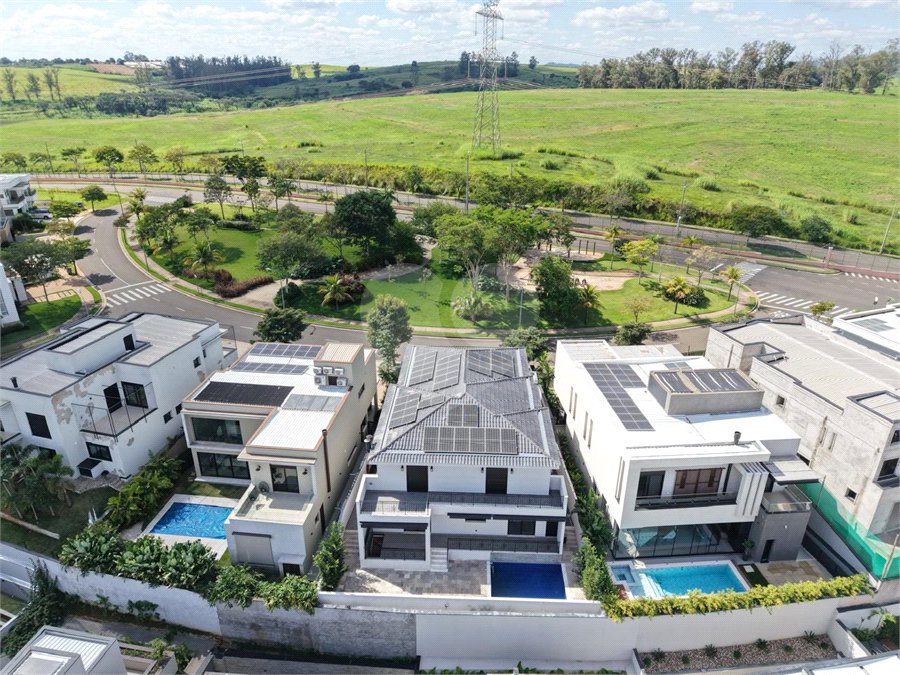Casa à venda com 4 suítes no condomínio Alphaville Dom Pedro 3, Campinas - SP