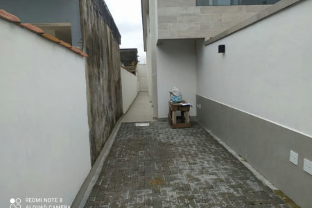 Sobrado com 3 dormitórios à venda, 107 m² por R$ 825.000,00 - Estuário - Santos/SP