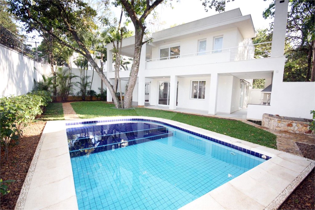 Casa à venda com 4 suítes no condomínio Vila Alba, São Paulo - SP