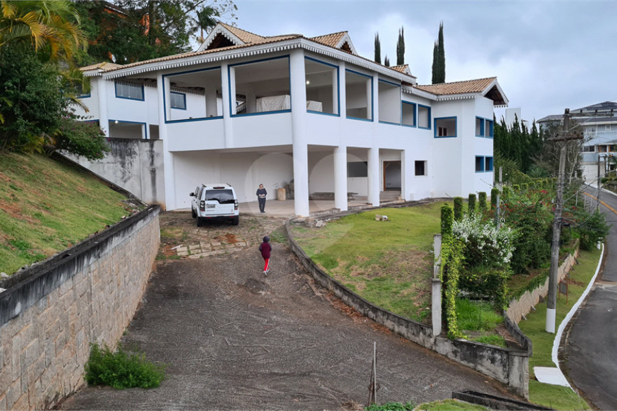 Casa à venda com 4 suítes no condomínio Suíça da Cantareira, Mairiporã - SP