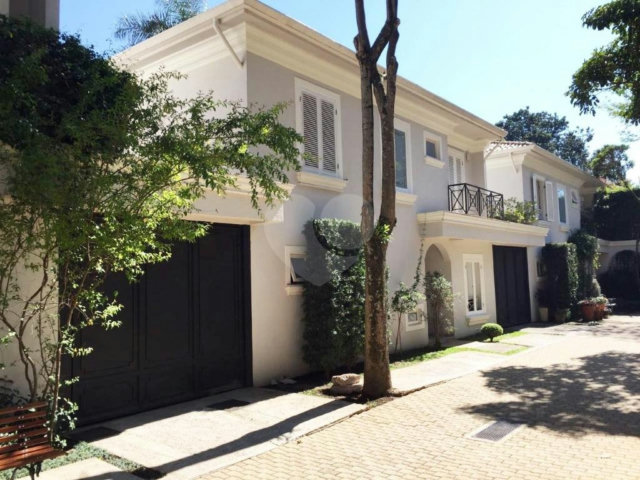 Casa à venda com 4 suítes no condomínio Saint Germain, São Paulo - SP