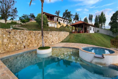 Casa à venda com 4 suítes no condomínio Parque da Fazenda, Itatiba - SP