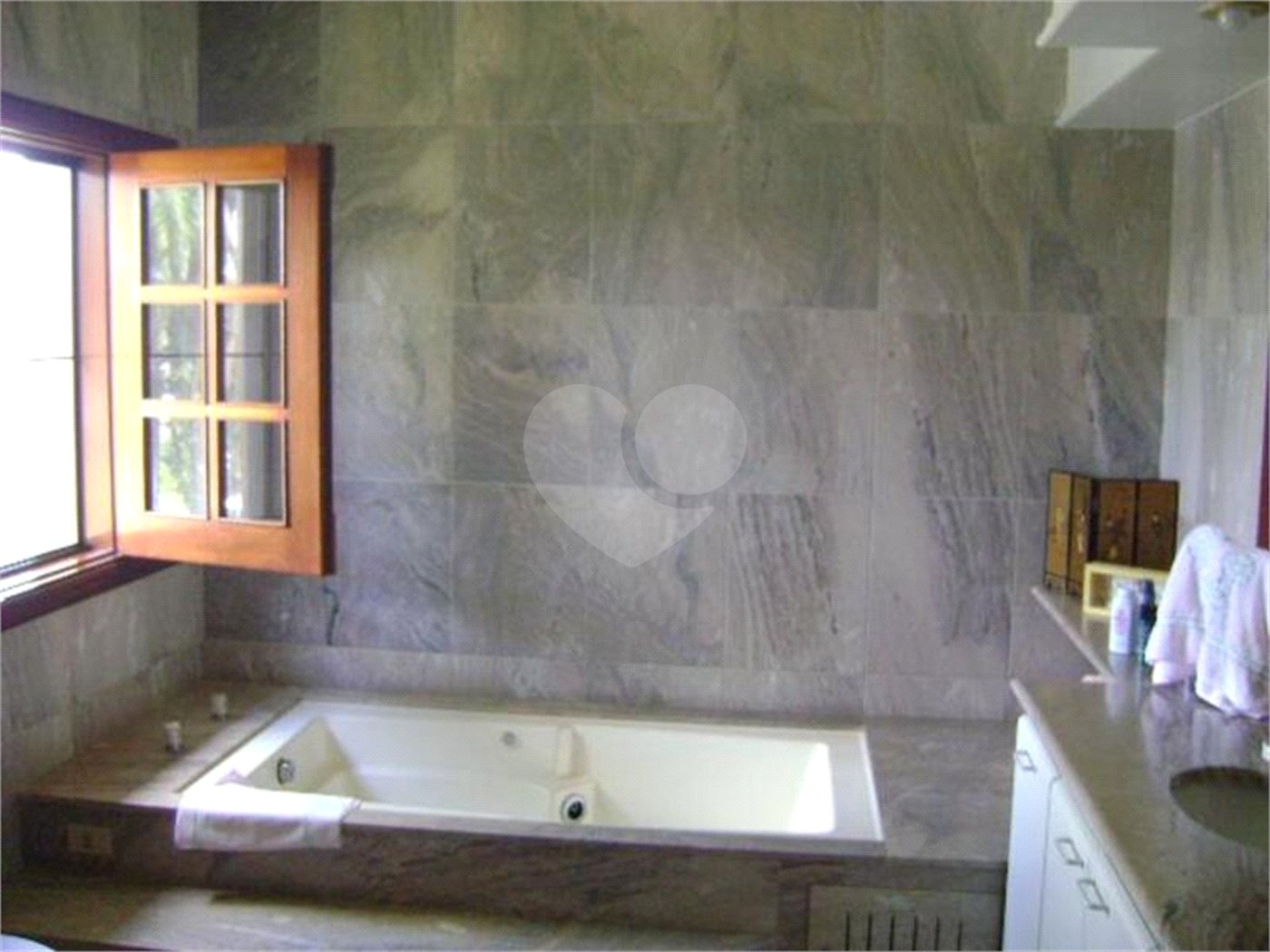 Casa à venda com 5 quartos, sendo 3 suítes, no condomínio Estância Marambaia, Vinhedo - SP