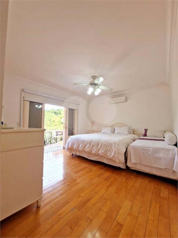 Casa à venda com 4 suítes no condomínio Estância Marambaia, Vinhedo - SP