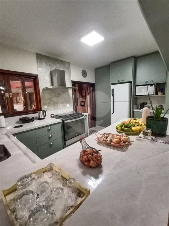 Casa à venda com 3 suítes no condomínio Aruã, Mogi das Cruzes - SP