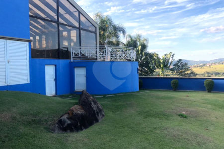 Casa à venda com 4 suítes no condomínio Osato, Atibaia - SP