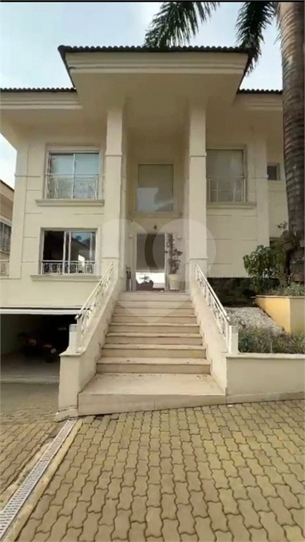 Casa à venda com 4 suítes no condomínio Villaggio Houda, São Paulo - SP