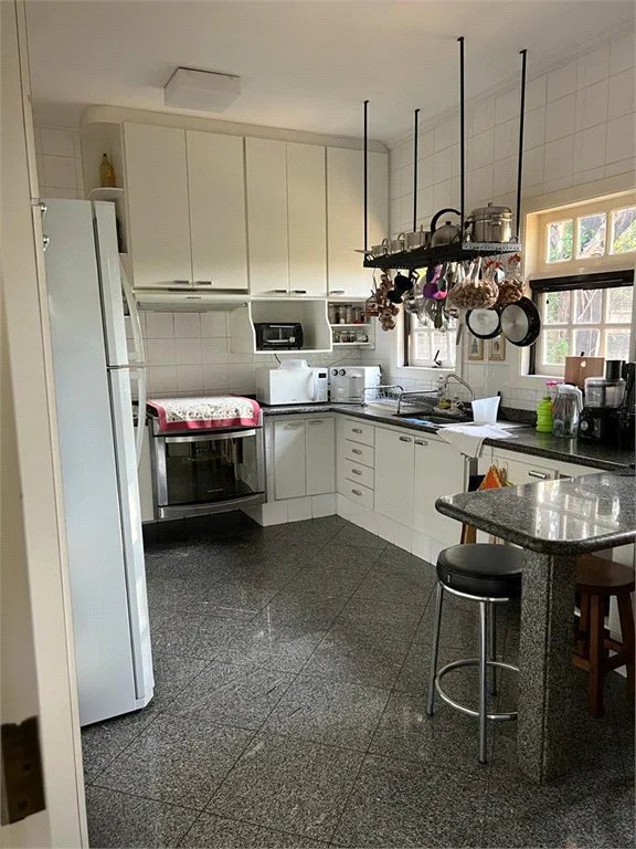 Casa à venda com 3 suítes no condomínio Fazenda Morumbi, São Paulo - SP