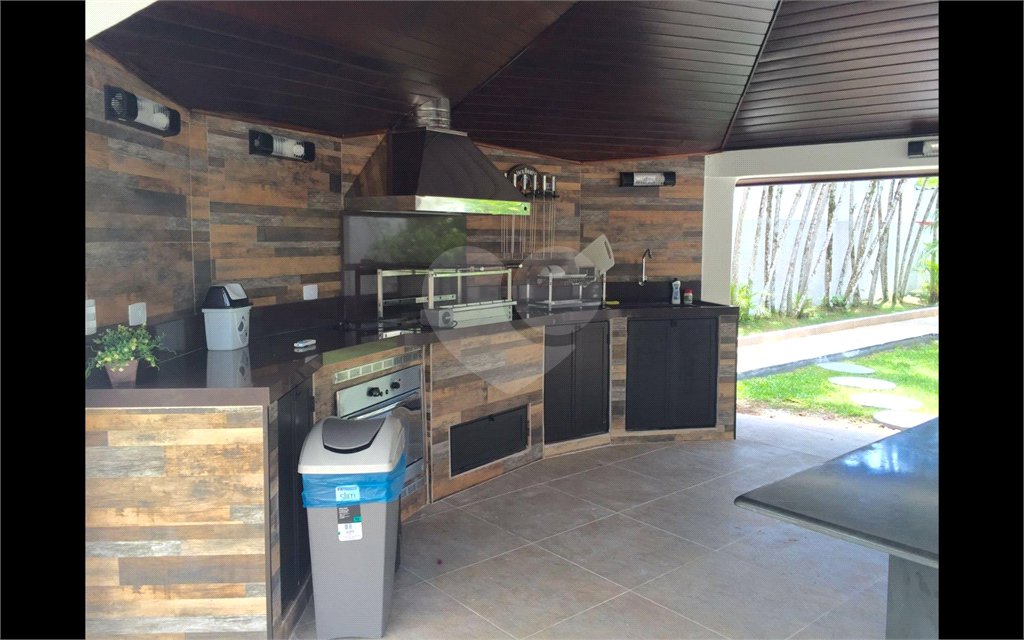 Casa à venda com 8 quartos, sendo 6 suítes,  no condomínio Acapulco, Guarujá - SP