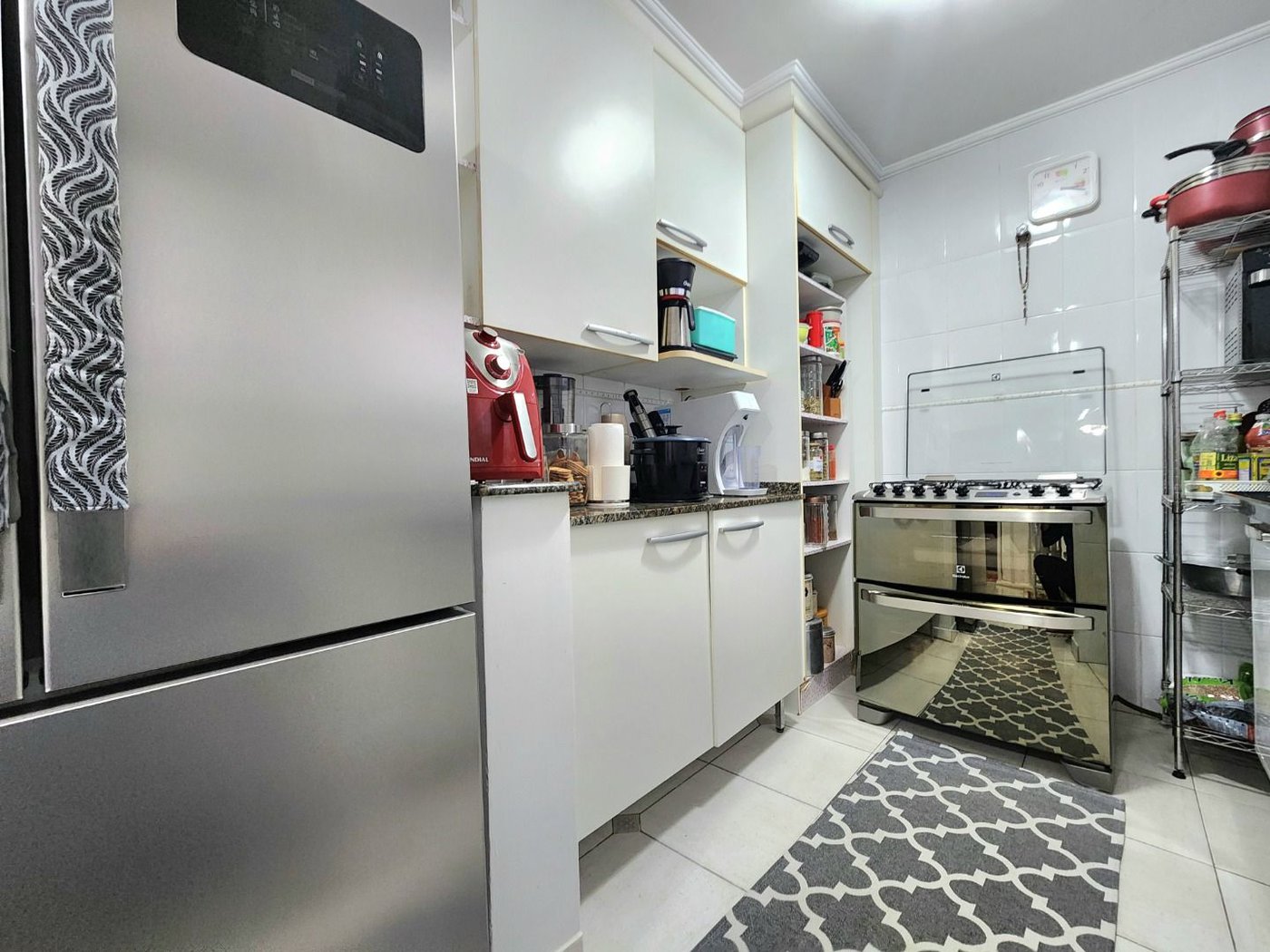 Casa próximo da praia com 3 dormitórios à venda, 128 m² por R$ 1.300.000 - Pompéia - Santos/SP