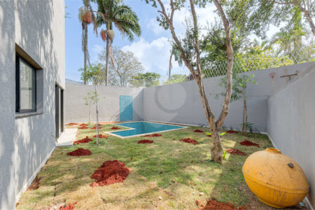 Casa à venda com 4 suítes no condomínio Reserva Robélia, São Paulo - SP