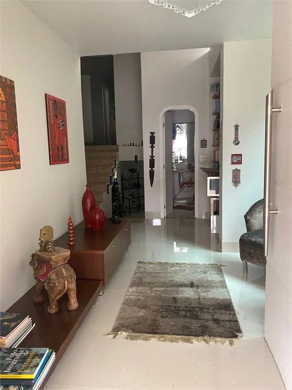 Casa à venda com 4 suítes no condomínio Granja Morumbi, São Paulo - SP