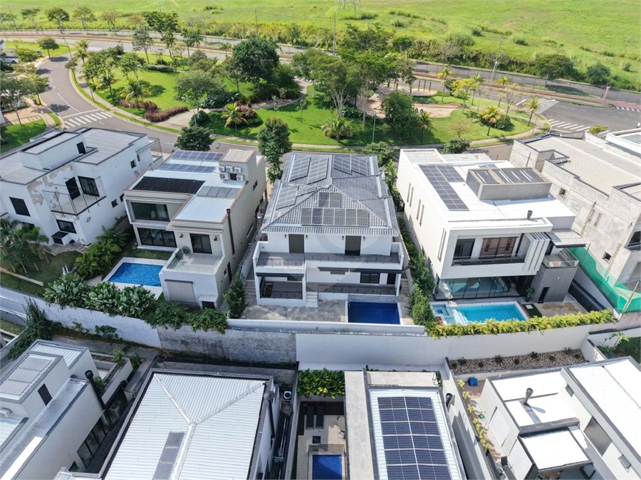 Casa à venda com 4 suítes no condomínio Alphaville Dom Pedro 3, Campinas - SP