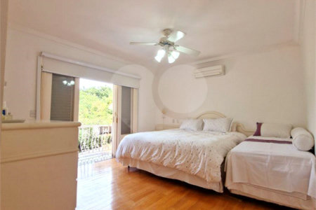 Casa à venda com 4 suítes no condomínio Estância Marambaia, Vinhedo - SP