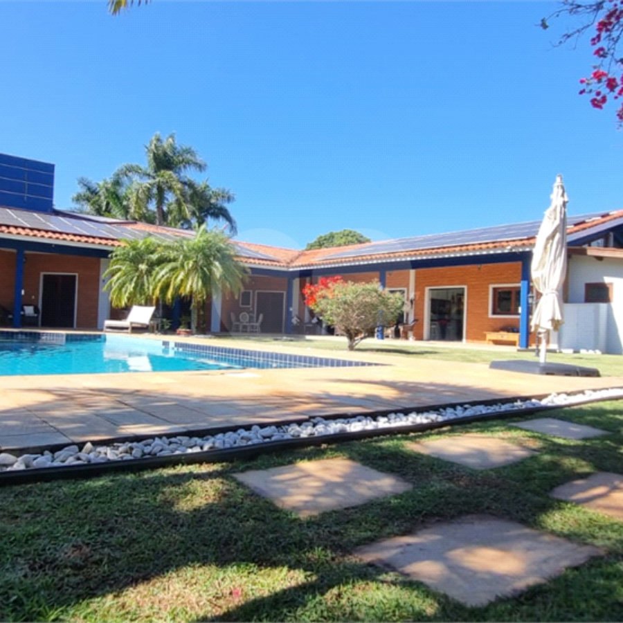 Casa à venda com 4 suítes no condomínio Residencial Vale das Laranjeiras, Indaiatuba - SP