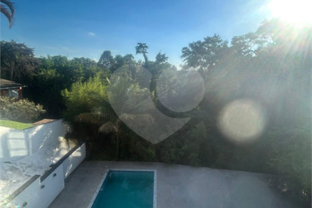 Casa à venda com 4 suítes no condomínio Estância Marambaia, Vinhedo - SP