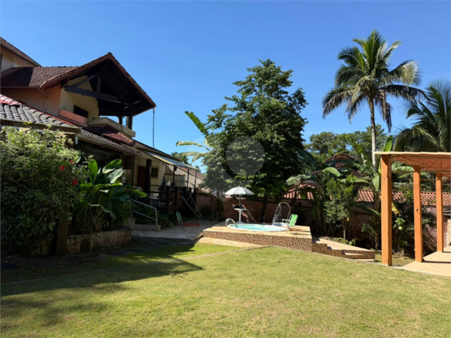 Casa à venda com 6 suítes em Massaguaçu, Caraguatatuba, SP