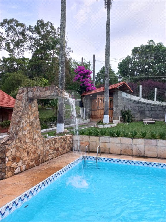 Casa à venda com 4 quartos, sendo 2 suítes,  no condomínio Cinco Lagos, Mairiporã - SP