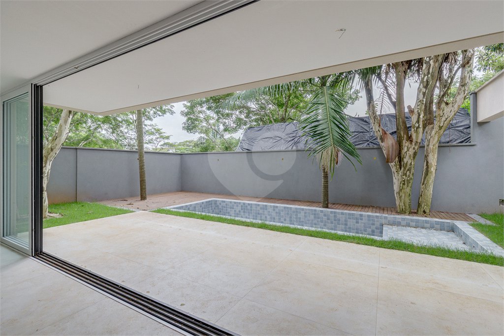 Casa à venda com 4 suítes no condomínio Garda, São Paulo - SP