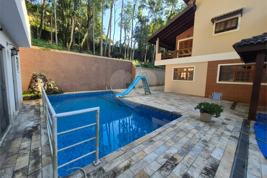 Casa à venda com 4 suítes no condomínio Alpes da Cantareira, Mairiporã - SP