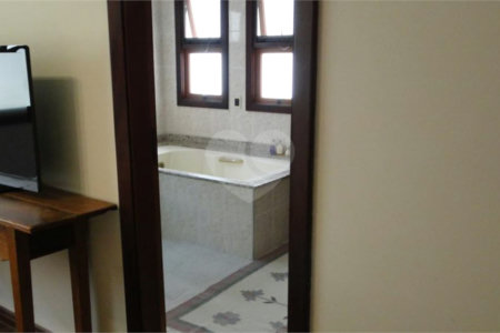Casa à venda ou para alugar com 4 suítes no condomínio Estância Marambaia, Vinhedo - SP