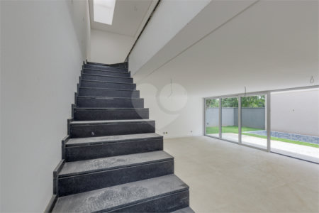 Casa à venda com 4 suítes no condomínio Garda, São Paulo - SP
