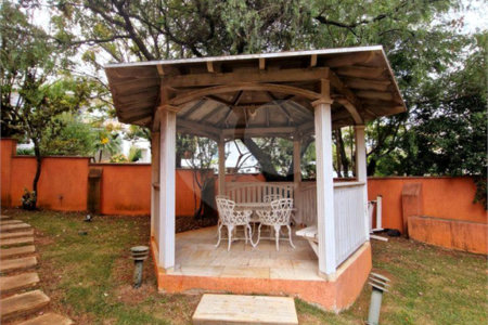 Casa à venda com 4 suítes no condomínio Estância Marambaia, Vinhedo - SP
