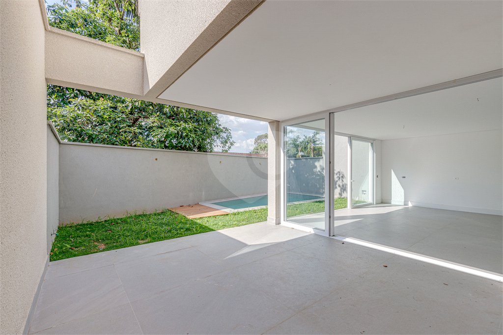 Casa à venda com 4 suítes no condomínio Vila Arese, São Paulo - SP