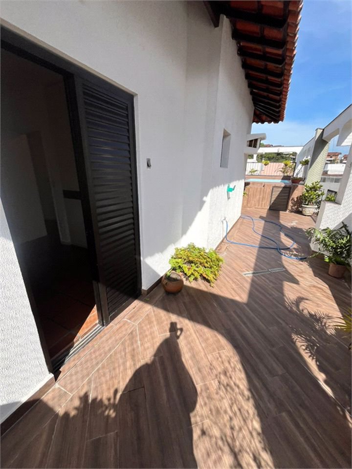 Apartamento com 4 dormitórios à venda, 259 m² por R$ 900.000,00 - Jardim Três Marias - Guarujá/SP
