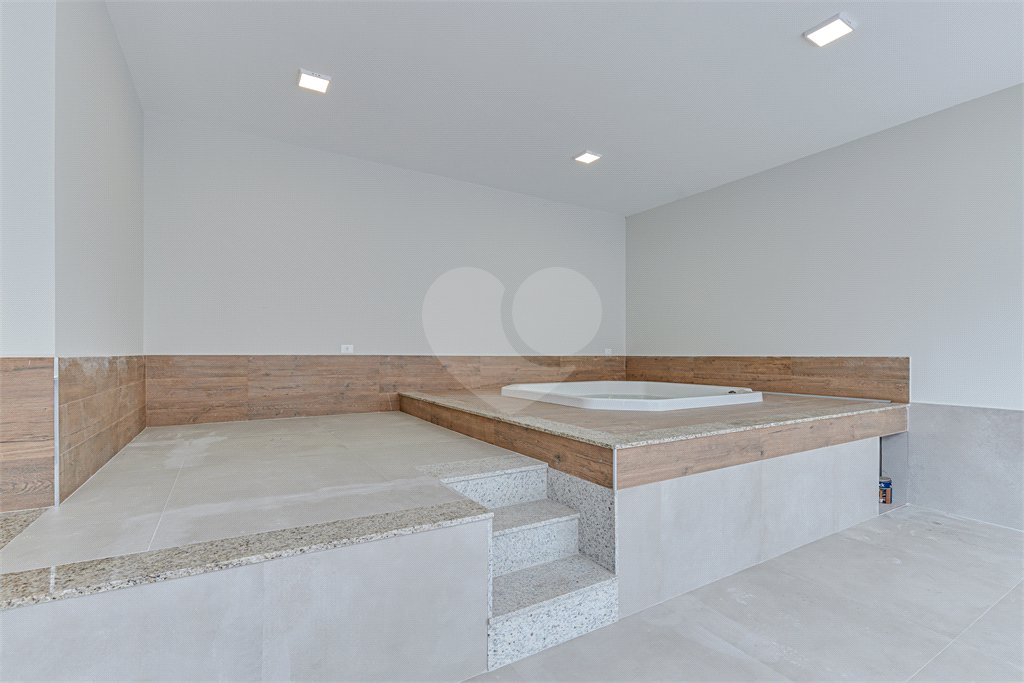 Casa à venda com 4 suítes no condomínio Carmen, São Paulo - SP