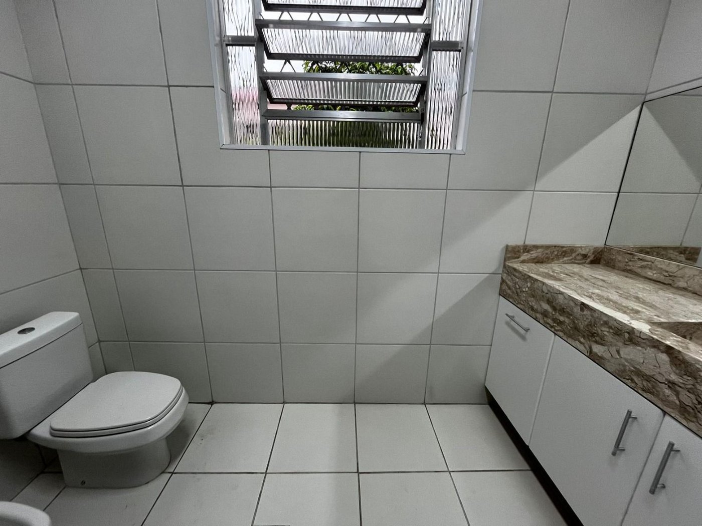 Sobrado com 3 dormitórios à venda, 152 m² por R$ 1.700.000,00 - Embaré - Santos/SP