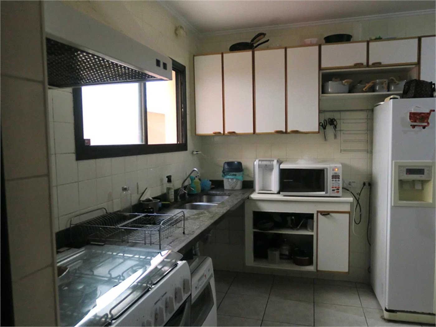 Casa à venda com 4 quartos, sendo 2 suítes, no condomínio Vila das Flores, São Paulo - SP