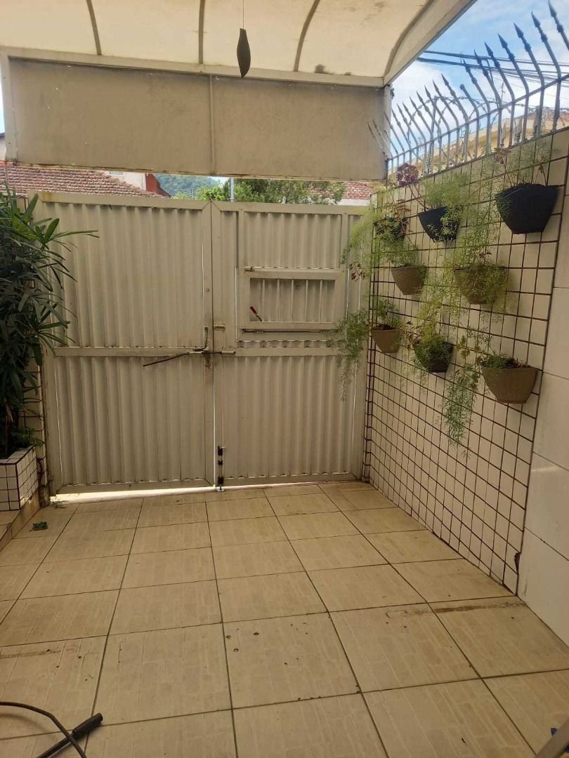 Casa com 3 dormitórios à venda, 110 m² por R$ 590.000,00 - Jardim Paraíso - São Vicente/SP