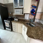 Apartamento Residencial à venda, Jardim Três Marias, Guarujá - AP0583.