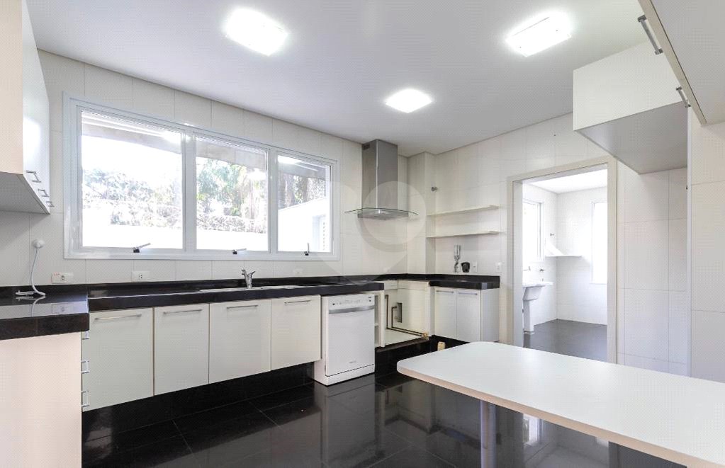 Casa à venda com 4 suítes no condomínio Vila Alba, São Paulo - SP