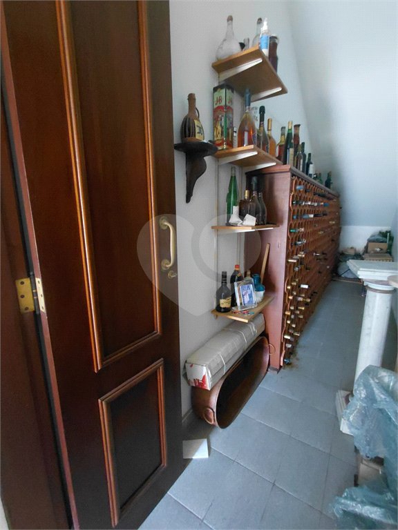 Casa à venda com 4 suítes no condomínio Ville Bourghese, São Paulo - SP
