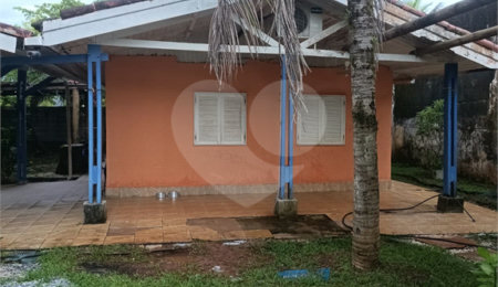 Casa à venda com 4 quartos, sendo 1 suíte, no condomínio Morada da Praia, Bertioga - SP