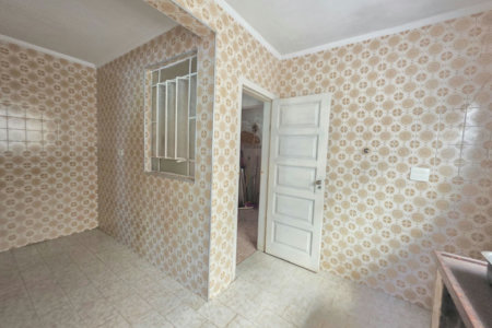 Sobrado com 3 dormitórios à venda, 129 m² por R$ 638.000,00 - Encruzilhada - Santos/SP