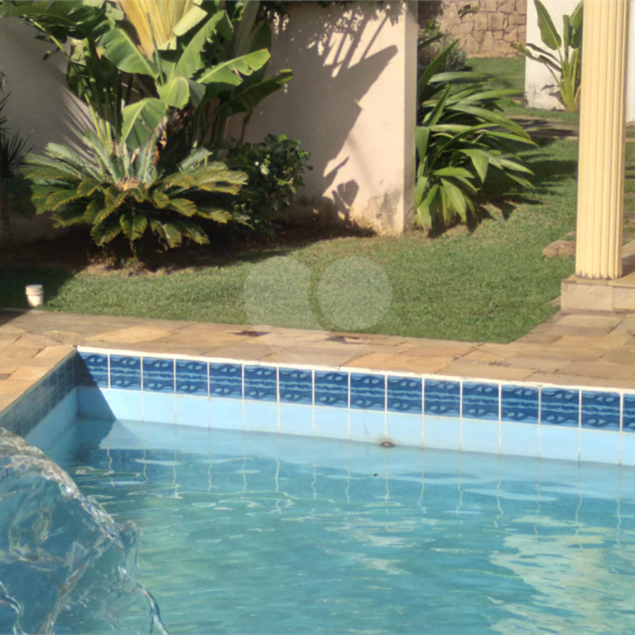Casa à venda com 4 suítes no condomínio Estância Marambaia, Vinhedo - SP